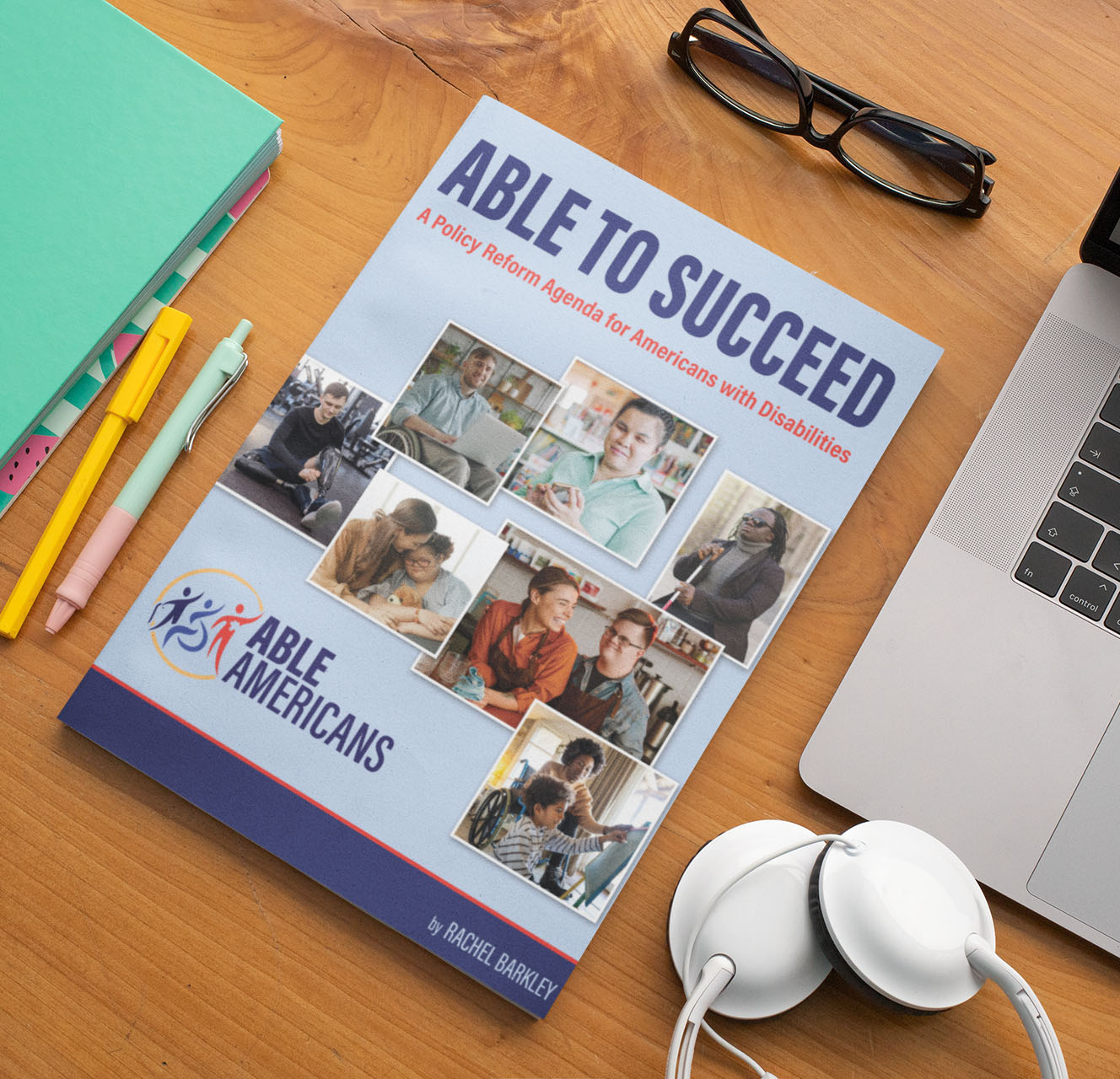 Able Americans magazine on wooden desktop